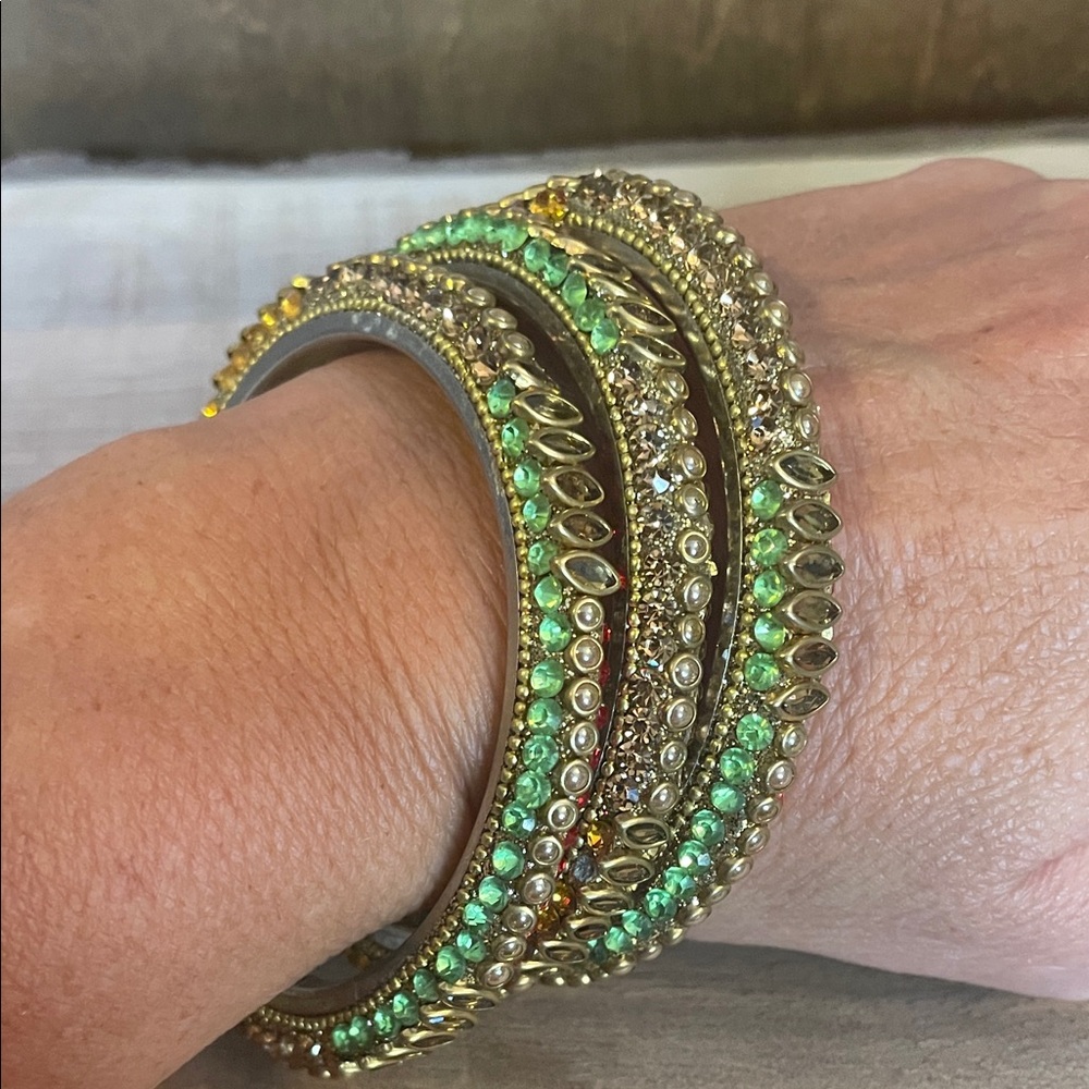 Elegant Gold and Jeweled Bangle Set